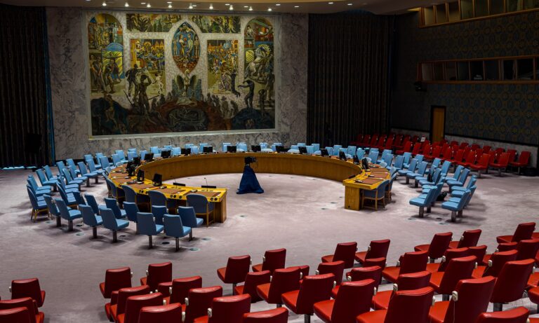 The horseshoe table of the United Nations Security Council chamber