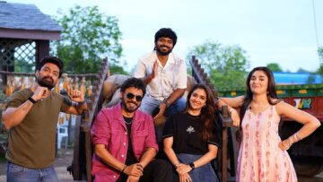 Kalyan Ram, Venkatesh, director Anil Ravipudi, Keerthy Suresh and Krithi Shetty posing by a bullock cart