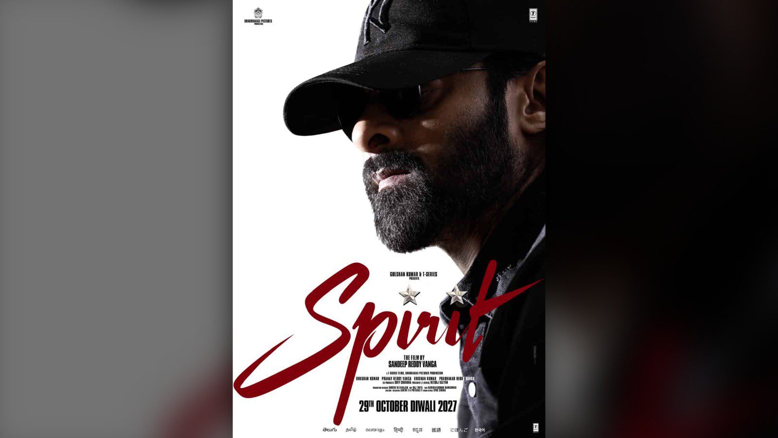 New Spirit poster of Prabhas in a black cap and dark glasses announcing the Spirit release date