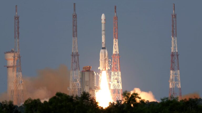 A GSLV rocket rising from its launch pad at Sriharikota on a column of flame and smoke