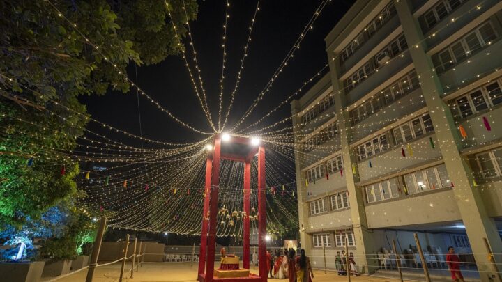 A Garba ground decorated with string lights; representative image