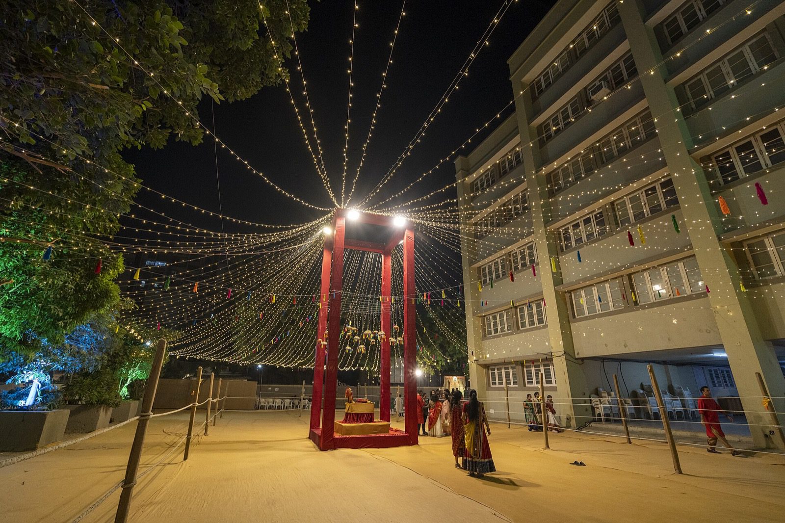 A Garba ground decorated with string lights; representative image